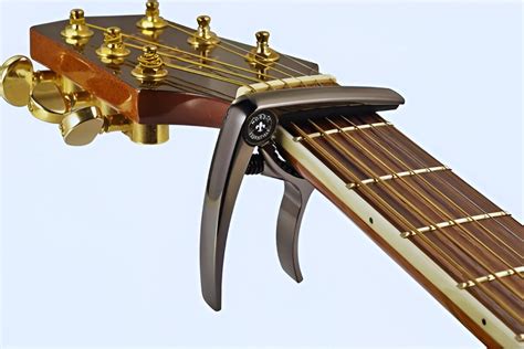 how to put capo on guitar and why it's important to keep your guitar in good condition